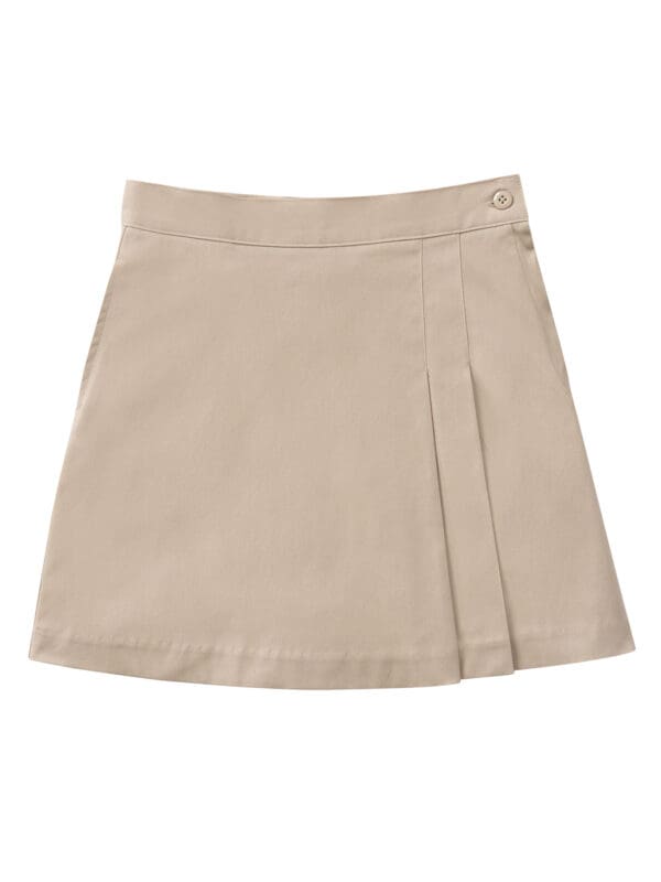 A tan skirt with two side pockets.